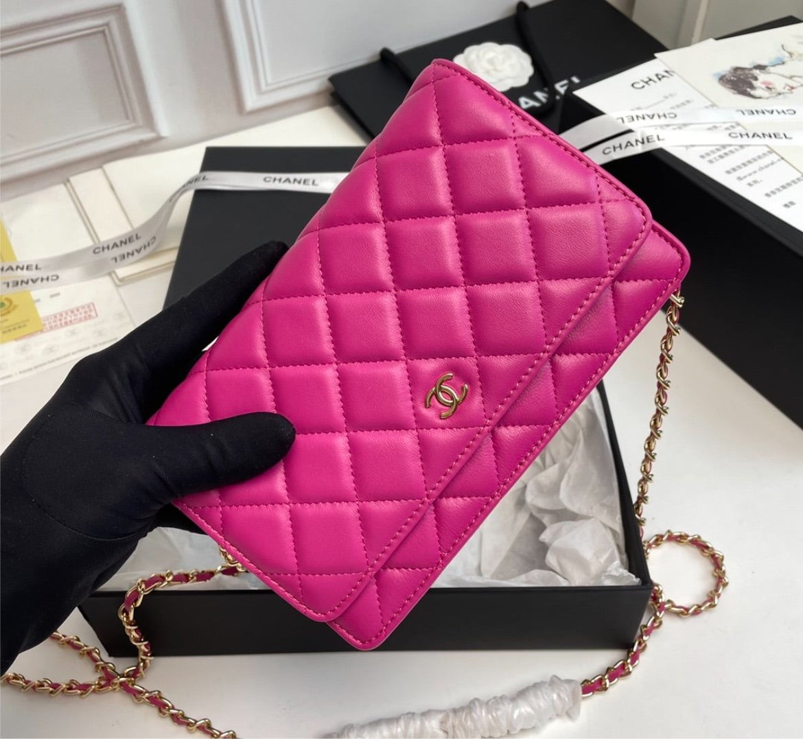Woman pink Chanel handbag