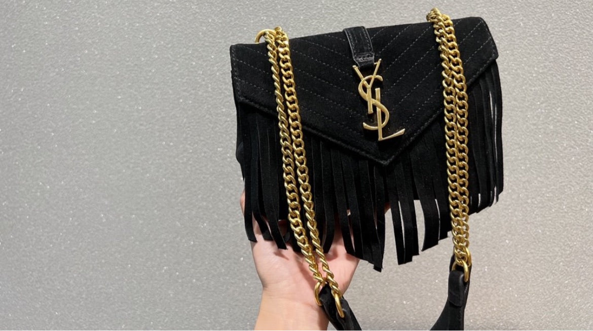 Woman Fringe YSL handbag